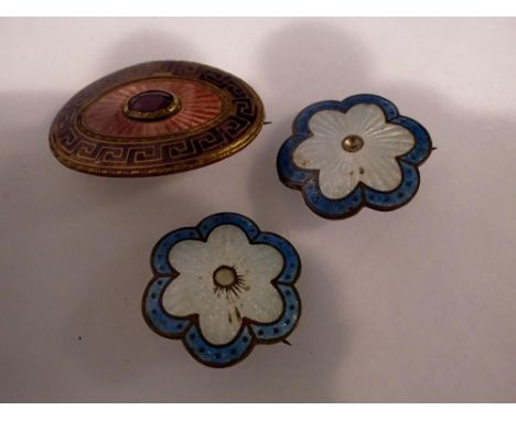 Three enamelled brooches, including a pair. UK P&amp;P Group 1 (£16+VAT for the first lot and £2+VAT for subsequent lots) 