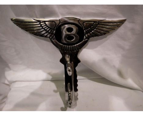 Bentley polished key form wall mounting hook, H: 26 cm. UK P&amp;P Group 1 (£16+VAT for the first lot and £2+VAT for subseque