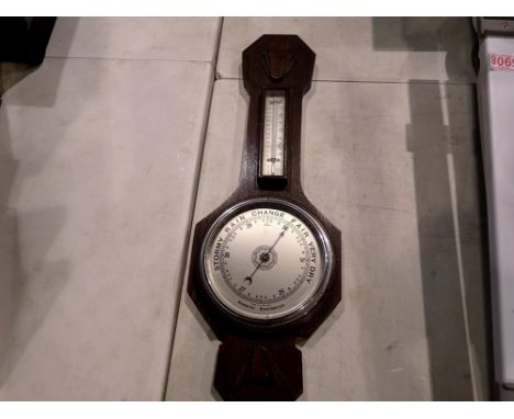 Oak cased barometer/thermometer. Not available for in-house P&amp;P 