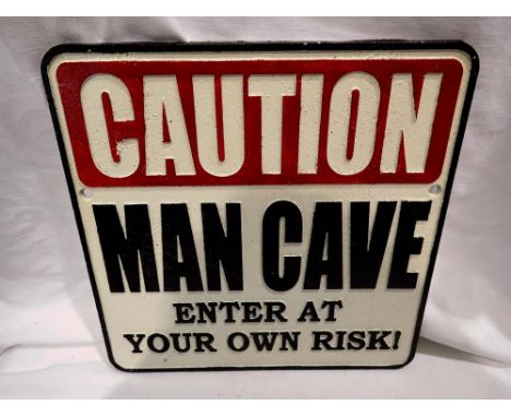 Cast iron Man Cave sign. W:25cm UK P&amp;P Group 1 (£16+VAT for the first lot and £2+VAT for subsequent lots) 