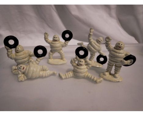 Garden Cast iron six small Michelin men, H: 80 mm. UK P&amp;P Group 1 (£16+VAT for the first lot and £2+VAT for subsequent lo
