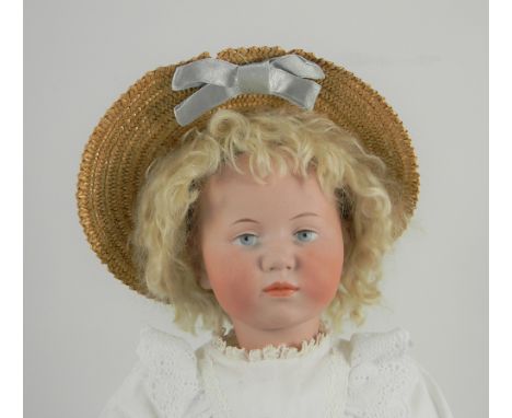 Kammer & Reinhardt 101 bisque head character doll, German circa 1910, the well moulded pale bisque head with painted pale blu