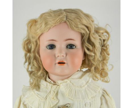 Large Kammer & Reinhardt 117 bisque head character doll, German circa 1910, the pale bisque head with weighted blue glass eye