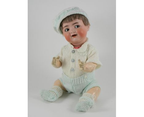 Simon & Halbig 126 bisque head baby, German circa 1910, with blue glass ‘flirty’ eyes, feathered eyebrows, open mouth and two