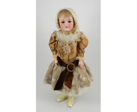 Simon & Halbig 550 bisque head girl doll, German circa 1910, with weighted brown glass eyes, lashes, painted eyebrows and ope