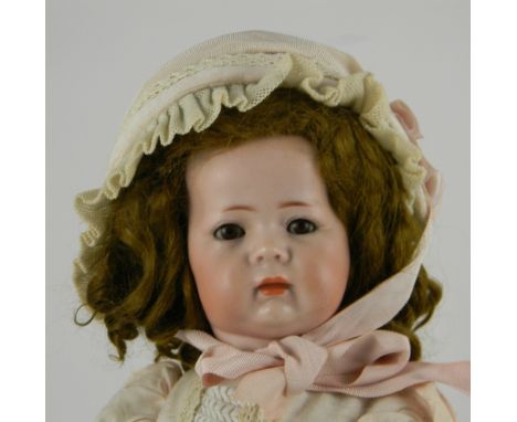 Kammer & Reinhardt 115/A bisque head character doll, German circa 1910, with weighted brown glass eyes, painted feather eyebr
