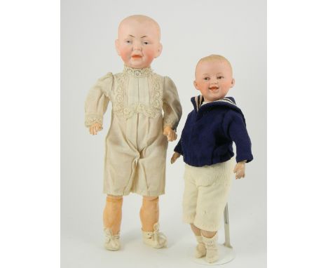 Gebruder Heubach bisque head character boy, German circa 1910, the well moulded head with blue intaglio eyes, open/closed mou