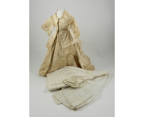 Beautiful original cream silk fashion doll gown, circa 1870, the longs skirt with lace panel to front and around hem,  jacket