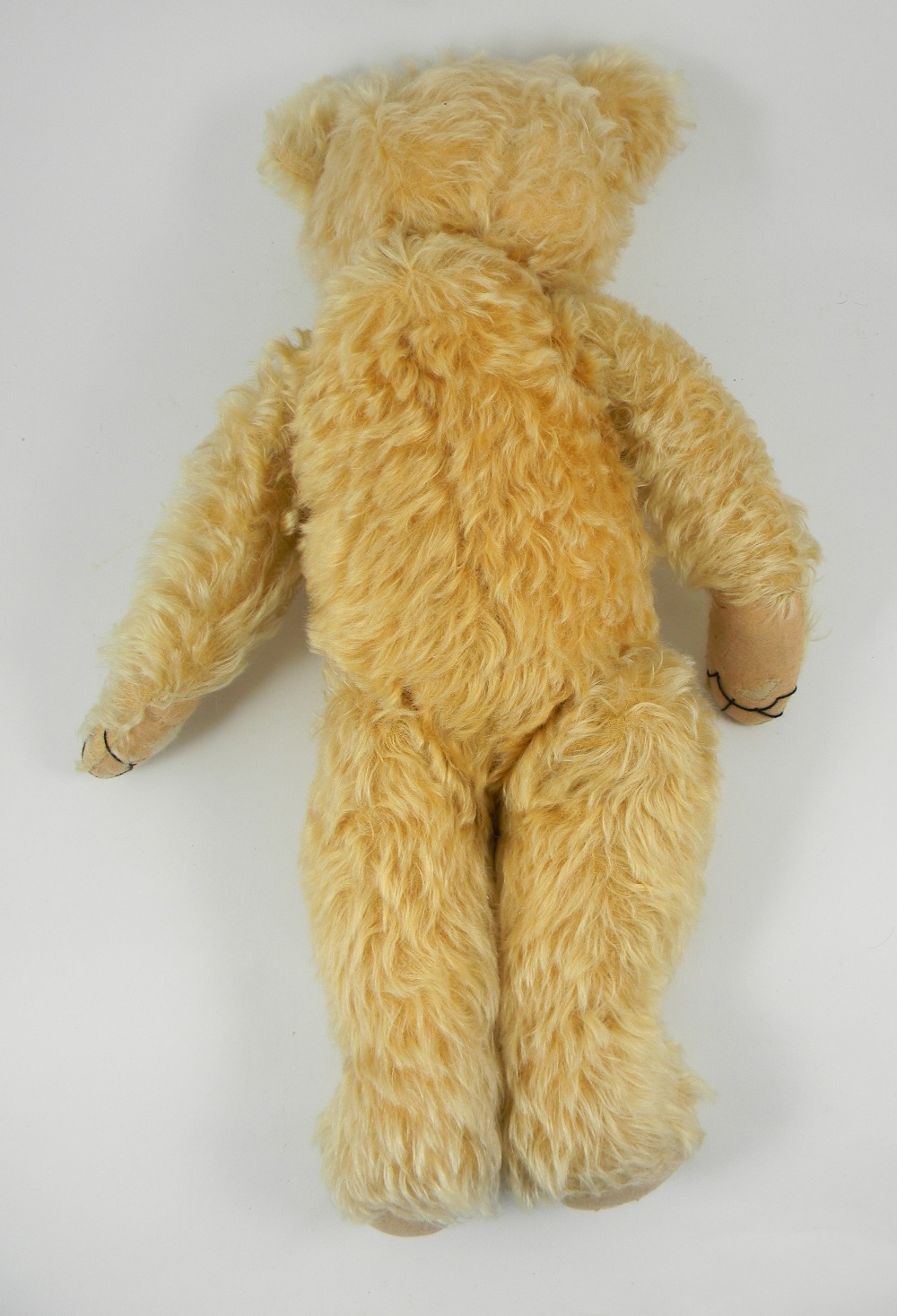 A golden mohair Merrythought Teddy bear, 1930s, kapok filled bear with ...