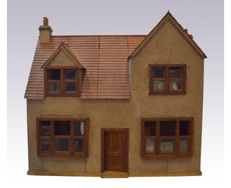 Large English dolls house, circa 1930, the wooden framed house with grey stone effect exterior, wooden panelled front door wi