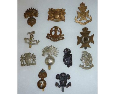 12 London Regimental cap badges inc Middlesex Regiment, Public Works Pioneer battalion, County of London Queen's Westminsters