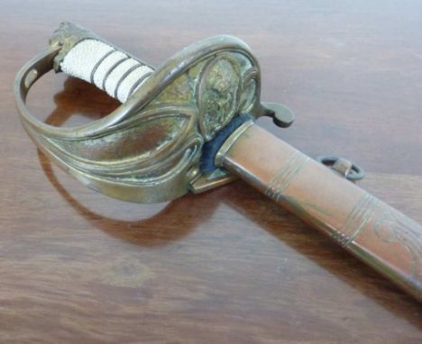 British Indian Naval Officer's sword with 31 inch single collared blade with etched detail and India star and fowled anchor a