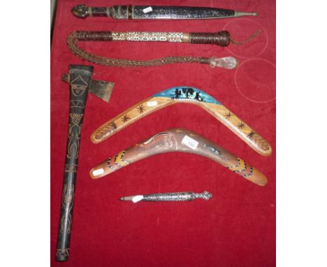 2 Persian style daggers, tribal style axe, 2 boomerangs and a Persian style whip (6)