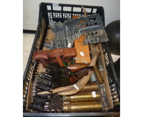 Box containing a large quantity of inert ammunition shell cases, cleaning kit, shrapnel damage from an aircraft, German style