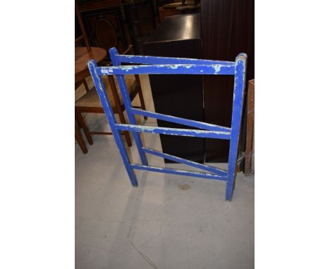 A vintage painted folding clothes horse