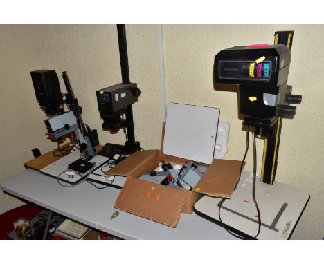 SEVEN PHOTOGRAPHIC ENLARGERS comprising of a Paterson Paragon 35 with Jessop timer, two Durst M301 ( one boxed, a Durst M370B