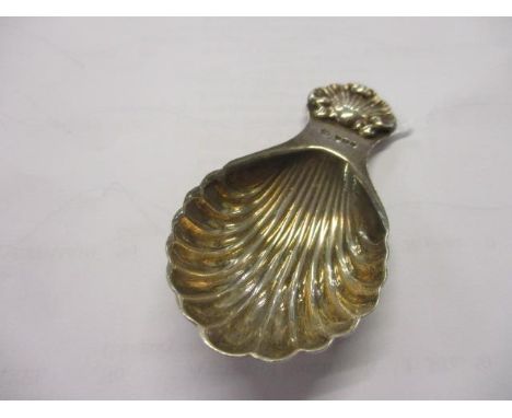A silver Victorian caddy spoon in the form of a shell 