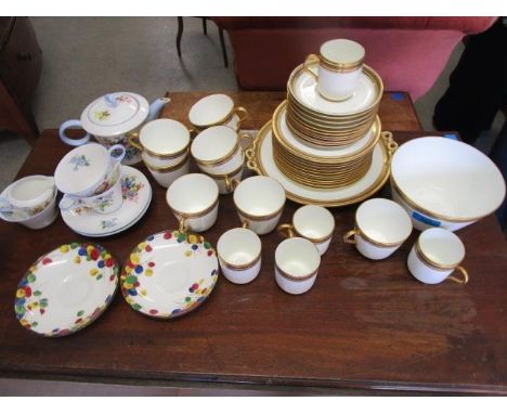A Shelley part teaset with floral pattern, two Royal Doulton saucers and a late Victorian china teaset 