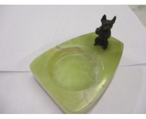 An Art Deco ashtray with a bronze French bull dog mounted on an onyx base 