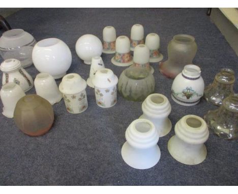 A collection of early to mid 20th century glass light shades to include etched and milk glass shades A/F and glass funnels 
