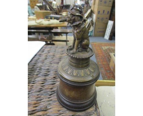 A Victorian bronze, main gass, cigar lighter, fashioned as a circus dog, on a walnut plinth, 9" h 