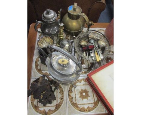 Metalware to include cutlery, brass jugs, a silver plated pot on stand, a pewter teapot and other items 