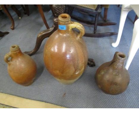 Three ceramic water jugs 