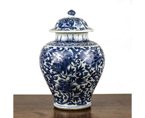 Blue and white porcelain baluster vase and coverChinese, late 17th/18th Centurydecorated with trailing dragon and flowering p