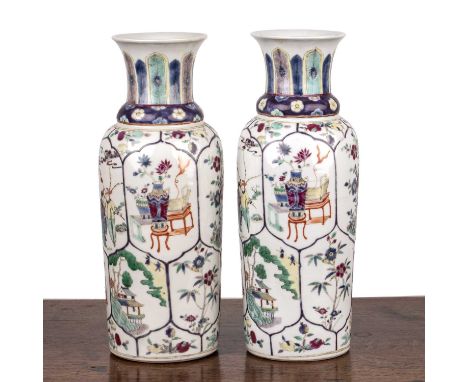 Pair of famille verte cylindrical porcelain vasesChinese, 19th Centuryeach painted with panels of figure groups, flowers, vas