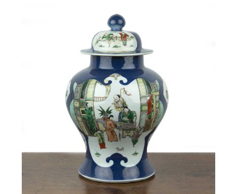 Powder blue porcelain vase and cover Chinese, 19th Centurythe lid with knop finial, the baluster vase decorated with famille 