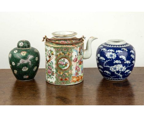 Group of three piecesChineseto include a Canton porcelain teapot, 16.5cm high, a blue and white ginger jar with a Kangxi mark