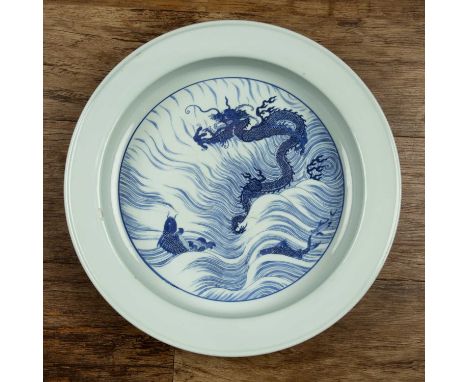 Imperial blue dragon and carp porcelain basinChinese, Kangxi and of the periodwith a flat base and curved sides, leading to a