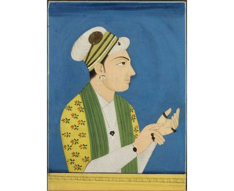 Collection of portraitsIndian and Iranian, 19th/20th Centurycomprising of a half portrait of a man in a formal robe and headp