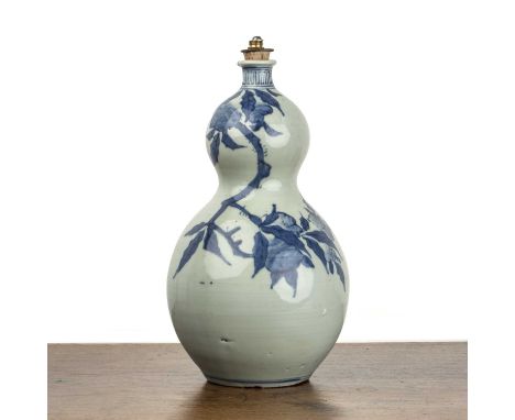 Blue and white Arita double gourd vaseJapanese, late 17th/early18th Centurypainted with trailing fruit and leaves, 27.5cm hig