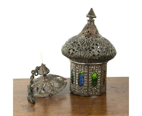Brass hanging lanternIndianwith coloured glass panels, 64cm high including the chain Provenance:- from the descendant of a Br