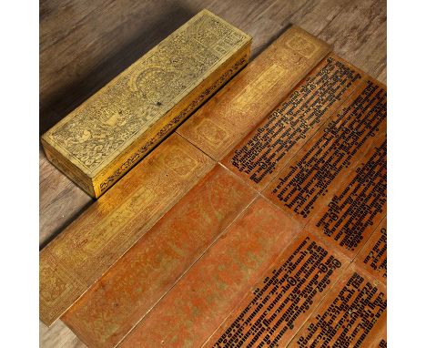 Tipitaka (Kammavaca)Burmese, circa 1890gold leaf and lacquer, complete with 16 leaves (61.5cm x 15.5cm), each lacquered in re