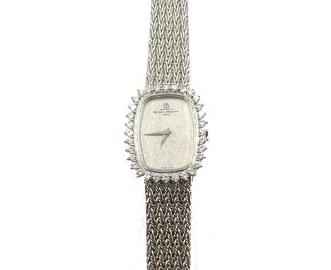 Baume & Mercier 18ct white gold manual wristwatch, bezel set with 32 diamonds and cabochon sapphire crown, on woven 18ct brac