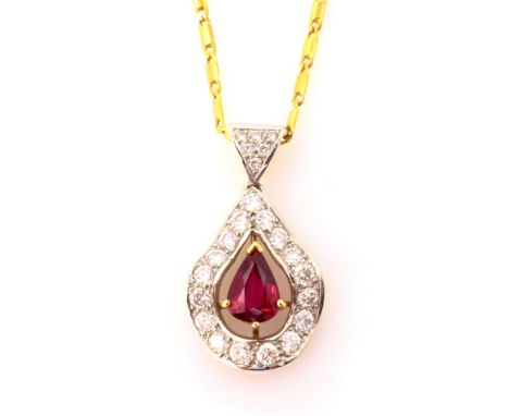 Pear shaped ruby and diamond 18ct white and yellow gold wavy pendant necklace, stamped 750 retailed Ogden Harrogate Condition