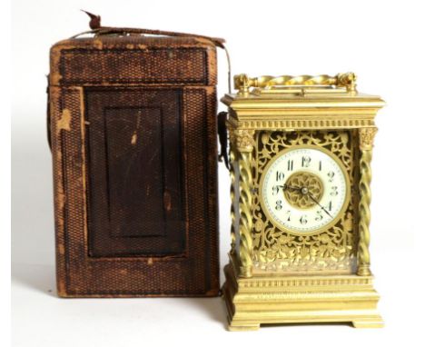 A Brass Striking and Repeating Carriage Clock, circa 1890, carrying handle and repeat button, base with engraved presentation