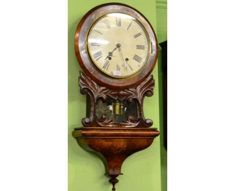 A Walnut Veneered Drop Dial Striking Wall Clock, circa 1880, leaf carved trunk with a central pendulum window, inlaid waisted