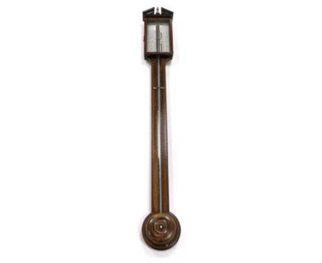 A Mahogany Stick Barometer, signed Wisker, York, circa 1820, broken arched pediment, exposed mercury tube, latched door, sing