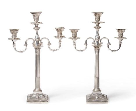 A Pair of Victorian Silver Candlesticks, with electroplated three-light branches, the candlesticks Carrington & Co, London 18