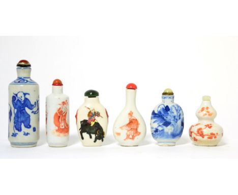 A Chinese Porcelain Snuff Bottle, of cylindrical form painted in iron red with figures, the stopper with bone spoon, 8.5cm hi