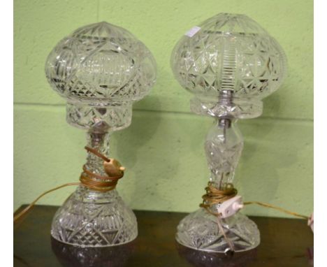 A Moulded and Cut Glass Electric Lamp Base and Mushroom Shade, 34cm high; and A Similar Lamp and Shade, 36cm high (2)