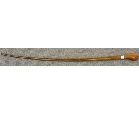 A Rhinoceros Horn Walking Stick, circa 1900, with ovoid pommel and curved tapering cap, 86cm long, 330.6g