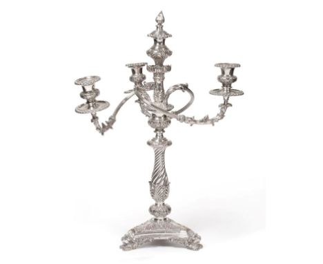 An Old Sheffield Plate Four-Light Candelabrum, crossed arrows mark for T & J Creswick, circa 1830, on acanthus decorated trif
