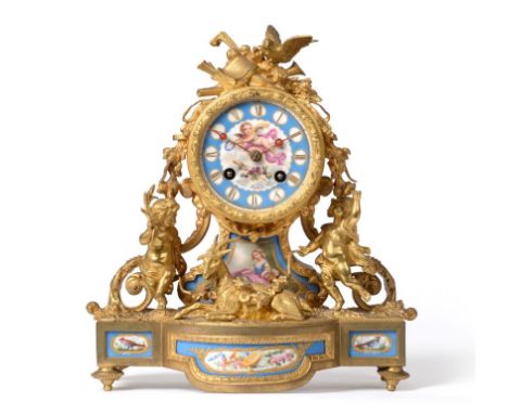 A French Ormolu and Porcelain Mounted Striking Mantel Clock, signed Henry Marc a Paris, circa 1890, case with swags of flower