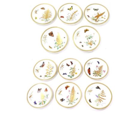 A Set of Eleven Royal Worcester Porcelain Dessert Plates, circa 1880, painted and gilt with butterflies amongst fronds within