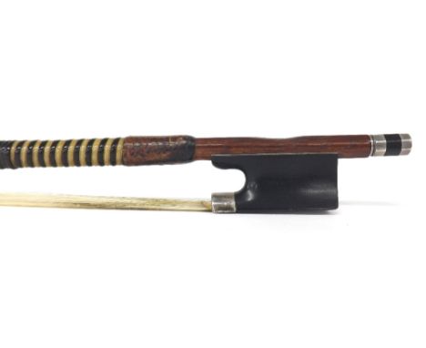 Silver mounted violin bow by Hoyer, the stick round, the ebony frog plain and the ebony adjuster with two silver bands, 58gm