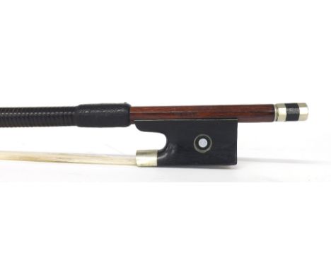 German nickel mounted violin bow stamped Penzel, the stick octagonal, the ebony frog inlaid with nickel rings enclosing pearl